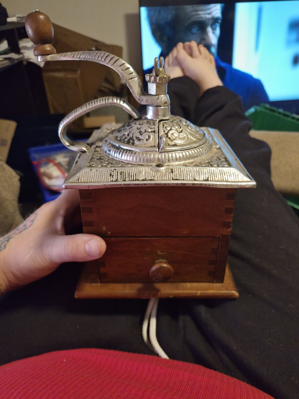 Vintage Manual Coffee Grinder with Ornate Silver-Tone Top